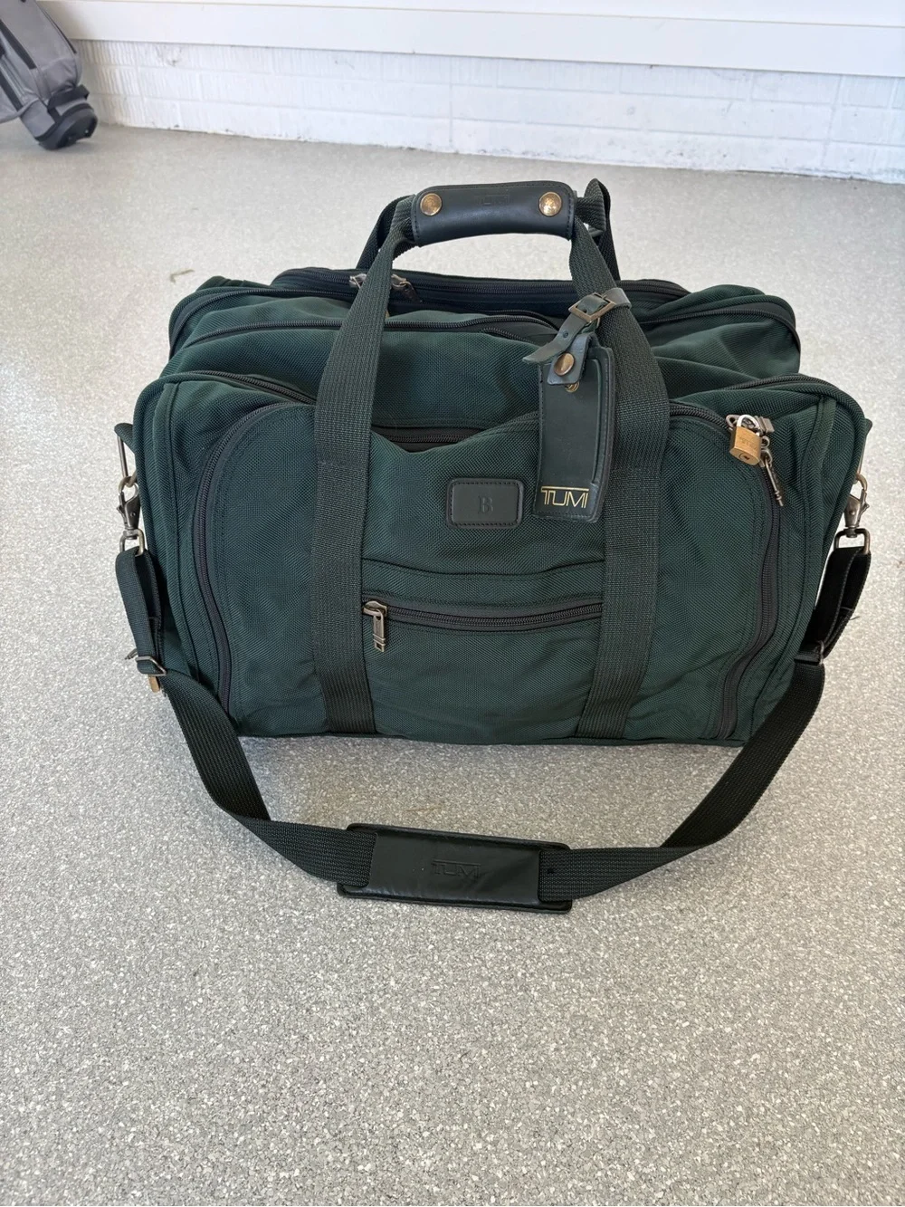 TUMI double expansion carry on travel bag, 22”wide, 10”deep, 15”tall with locks